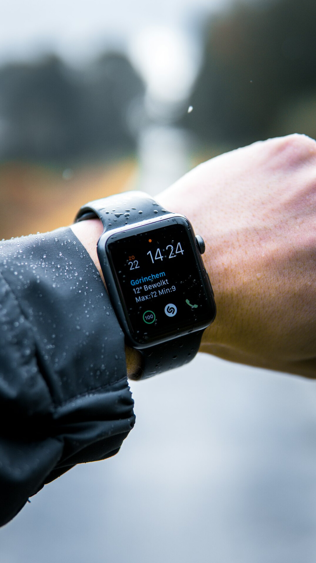 person meditating with smartwatch