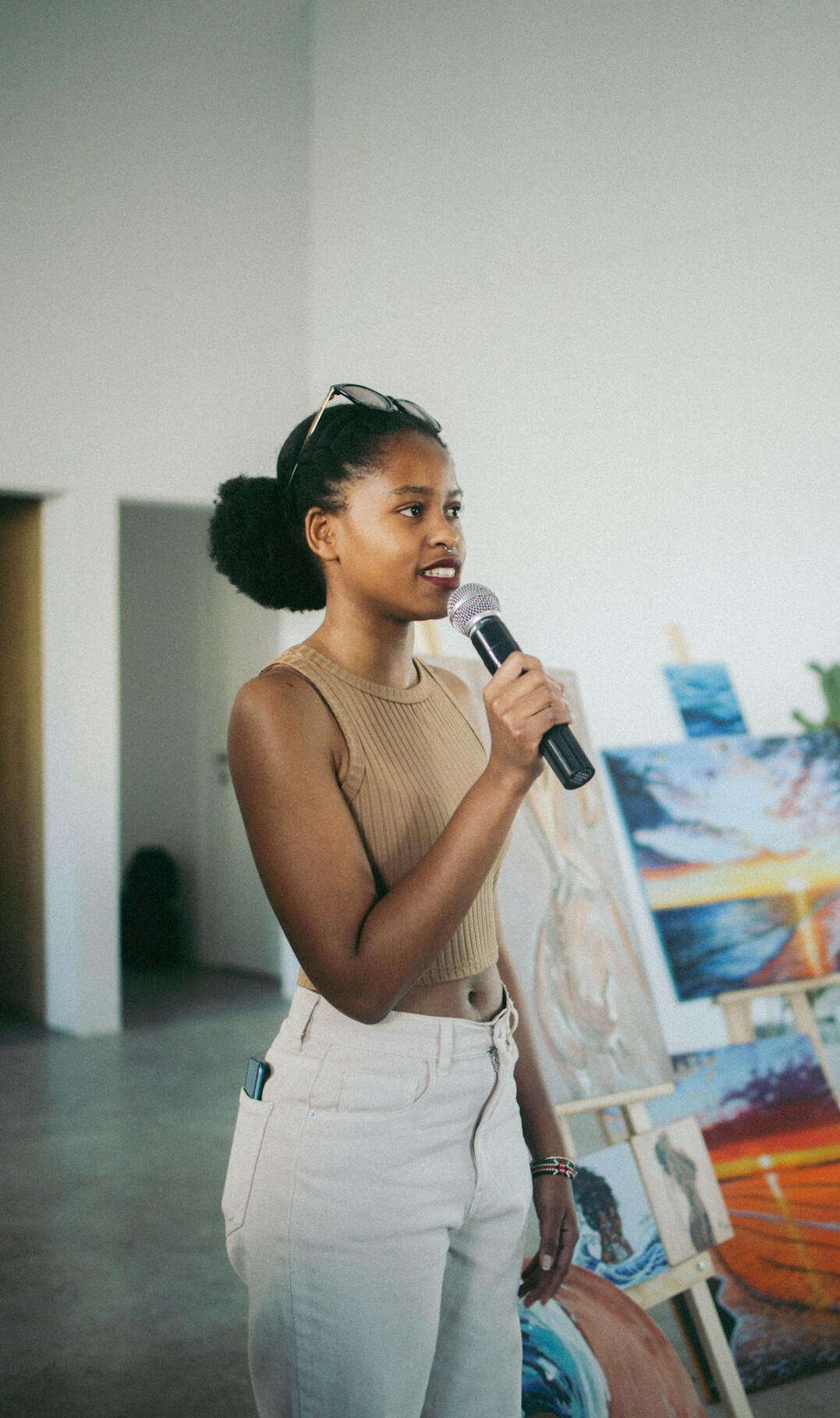 confident woman speaking on stage